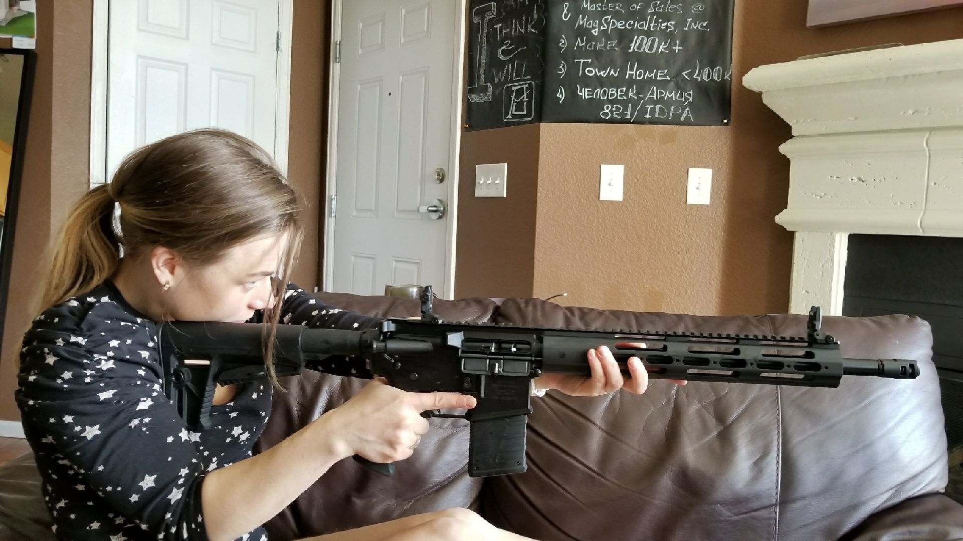 woman sampling firearm